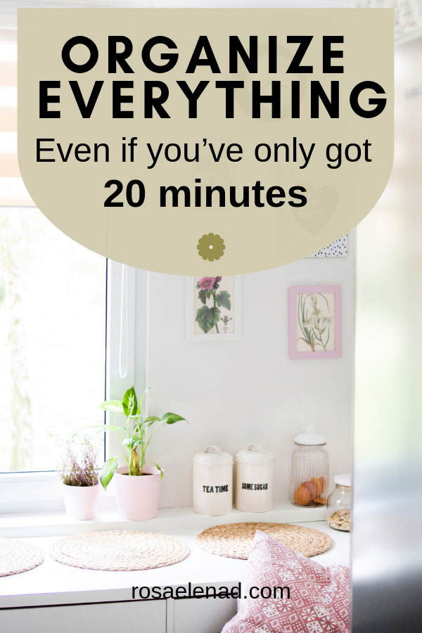 Pots Near Windowpane on White Wooden Cabinet with text overlay organize everything, even if you've only got 20 min